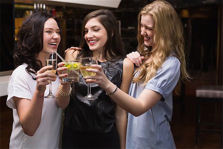 simsearch:400-04040205,k - Pretty friends having a drink together at the bar Stock Photo - Budget Royalty-Free & Subscription, Code: 400-07900623