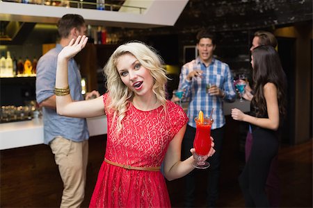 simsearch:6122-08212398,k - Pretty blonde drinking a cocktail at the bar Stock Photo - Budget Royalty-Free & Subscription, Code: 400-07900689