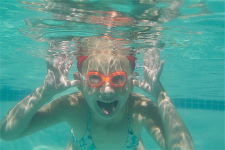 swimsuit underwater posing - Cute kid posing underwater in pool at the leisure center Stock Photo - Budget Royalty-Free & Subscription, Code: 400-07900858