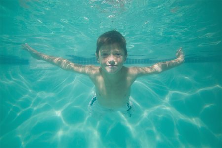 swimsuit underwater posing - Cute kid posing underwater in pool at the leisure center Stock Photo - Budget Royalty-Free & Subscription, Code: 400-07900865