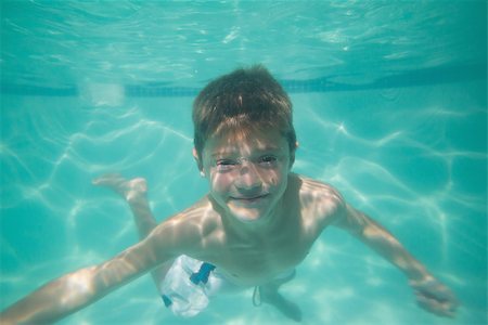 swimsuit underwater posing - Cute kid posing underwater in pool at the leisure center Stock Photo - Budget Royalty-Free & Subscription, Code: 400-07900866