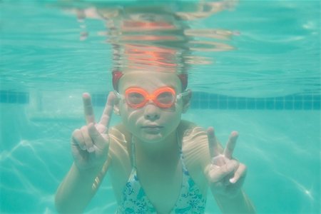 swimsuit underwater posing - Cute kid posing underwater in pool at the leisure center Stock Photo - Budget Royalty-Free & Subscription, Code: 400-07900860