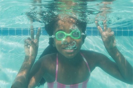 swimsuit underwater posing - Cute kid posing underwater in pool at the leisure center Stock Photo - Budget Royalty-Free & Subscription, Code: 400-07900862