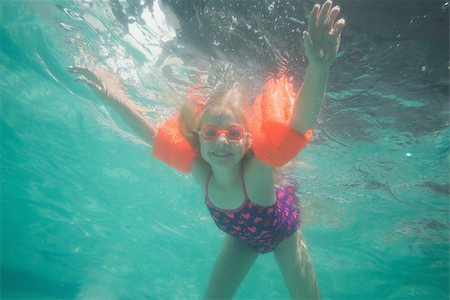 swimsuit underwater posing - Cute kid posing underwater in pool at the leisure center Stock Photo - Budget Royalty-Free & Subscription, Code: 400-07900877