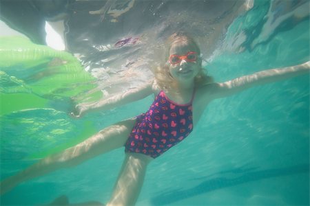 swimsuit underwater posing - Cute kid posing underwater in pool at the leisure center Stock Photo - Budget Royalty-Free & Subscription, Code: 400-07900878