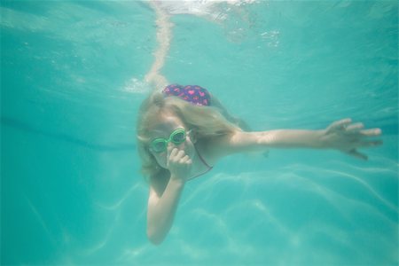 swimsuit underwater posing - Cute kid posing underwater in pool at the leisure center Stock Photo - Budget Royalty-Free & Subscription, Code: 400-07900870