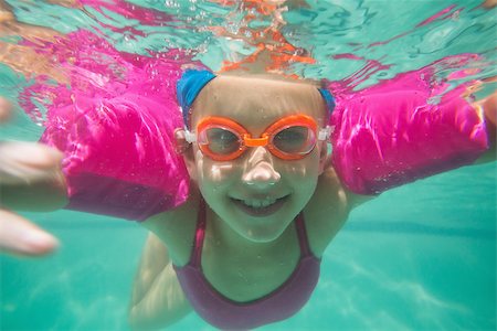 swimsuit underwater posing - Cute kid posing underwater in pool at the leisure center Stock Photo - Budget Royalty-Free & Subscription, Code: 400-07900884