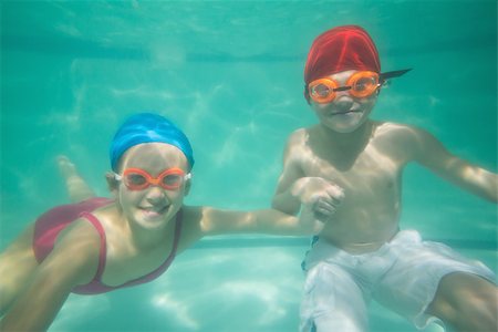 swimsuit underwater posing - Cute kids posing underwater in pool at the leisure center Stock Photo - Budget Royalty-Free & Subscription, Code: 400-07900885