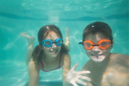 swimsuit underwater posing - Cute kids posing underwater in pool at the leisure center Stock Photo - Budget Royalty-Free & Subscription, Code: 400-07900887