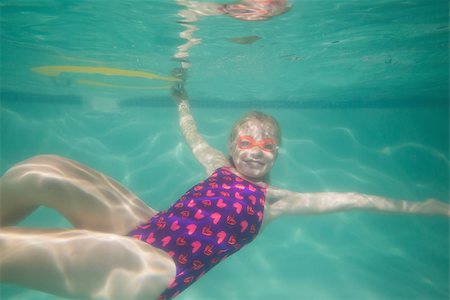 swimsuit underwater posing - Cute kid posing underwater in pool at the leisure center Stock Photo - Budget Royalty-Free & Subscription, Code: 400-07900880