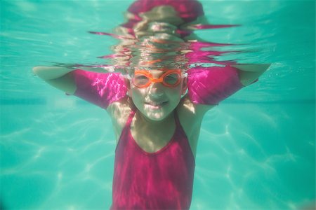 swimsuit underwater posing - Cute kid posing underwater in pool at the leisure center Stock Photo - Budget Royalty-Free & Subscription, Code: 400-07900883