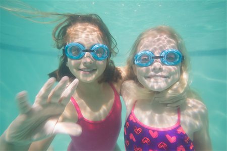 swimsuit underwater posing - Cute kids posing underwater in pool at the leisure center Stock Photo - Budget Royalty-Free & Subscription, Code: 400-07900896