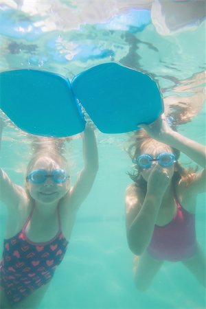 swimsuit underwater posing - Cute kids posing underwater in pool at the leisure center Stock Photo - Budget Royalty-Free & Subscription, Code: 400-07900899