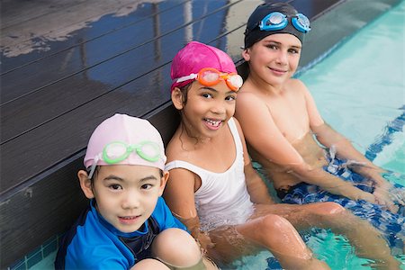 simsearch:640-02951323,k - Cute swimming class in the pool at the leisure center Stockbilder - Microstock & Abonnement, Bildnummer: 400-07900953