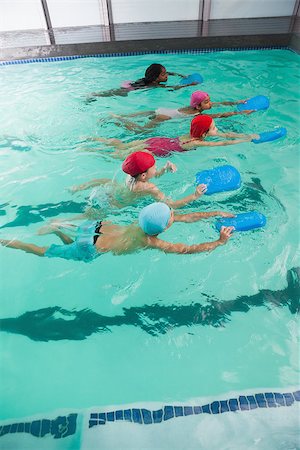 simsearch:640-06963379,k - Cute little kids in the swimming pool at the leisure center Photographie de stock - Aubaine LD & Abonnement, Code: 400-07901118