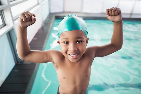 Cute little boy cheering at the pool at the leisure center Stock Photo - Budget Royalty-Free & Subscription, Code: 400-07901144