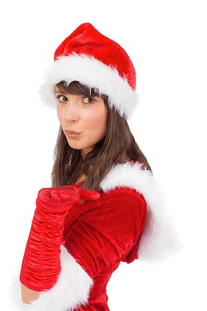 simsearch:693-06021827,k - Pretty girl in santa costume holding hand out on white background Foto de stock - Super Valor sin royalties y Suscripción, Código: 400-07901411