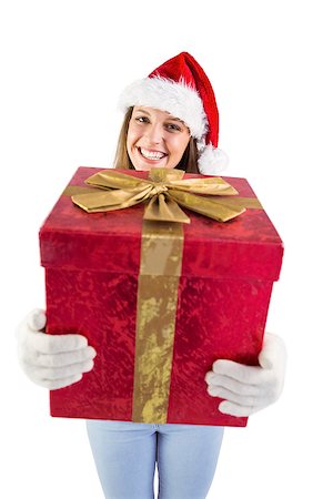 simsearch:400-07902186,k - Festive young woman holding a gift on white background Foto de stock - Super Valor sin royalties y Suscripción, Código: 400-07901487