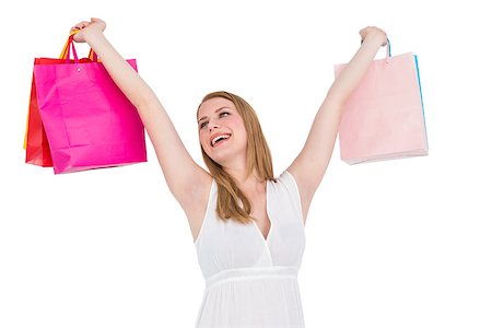 simsearch:859-07845866,k - Blonde woman raising shopping bags on white background Stock Photo - Budget Royalty-Free & Subscription, Code: 400-07901945