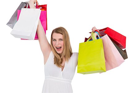 simsearch:859-07845866,k - Blonde woman raising shopping bags on white background Stock Photo - Budget Royalty-Free & Subscription, Code: 400-07901946