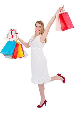 simsearch:400-04643147,k - Elegant blonde with shopping bags and gifts on white background Foto de stock - Super Valor sin royalties y Suscripción, Código: 400-07901952