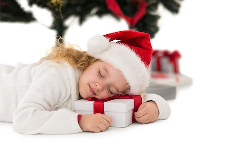 simsearch:400-07753751,k - Festive little girl napping on a gift on white background Stock Photo - Budget Royalty-Free & Subscription, Code: 400-07902176