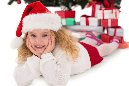 simsearch:400-07902186,k - Festive little girl smiling at camera on white background Foto de stock - Super Valor sin royalties y Suscripción, Código: 400-07902178