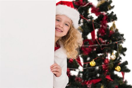 simsearch:400-07753751,k - Festive little girl showing a poster on white background Stock Photo - Budget Royalty-Free & Subscription, Code: 400-07902179
