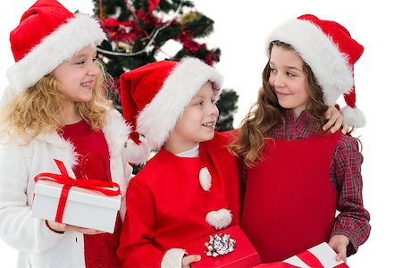 simsearch:400-07902186,k - Festive little siblings holding gifts on white background Foto de stock - Super Valor sin royalties y Suscripción, Código: 400-07902183