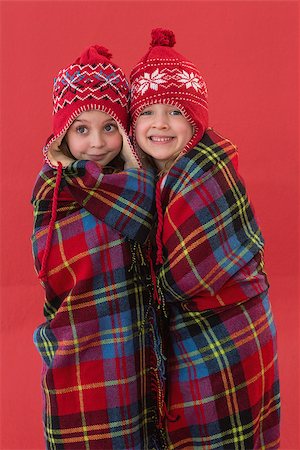 simsearch:400-05352235,k - Festive little girls under a blanket on red background Photographie de stock - Aubaine LD & Abonnement, Code: 400-07902198