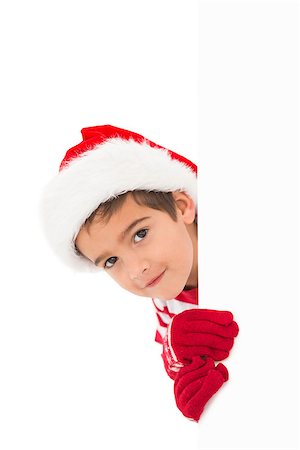 simsearch:400-07902186,k - Festive little boy showing a card on white background Foto de stock - Super Valor sin royalties y Suscripción, Código: 400-07902225