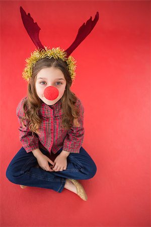 simsearch:400-07902186,k - Festive little girl wearing red nose on red background Foto de stock - Super Valor sin royalties y Suscripción, Código: 400-07902235