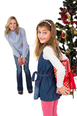 simsearch:400-07902186,k - Little girl hiding christmas gift from mother on white background Foto de stock - Super Valor sin royalties y Suscripción, Código: 400-07902358