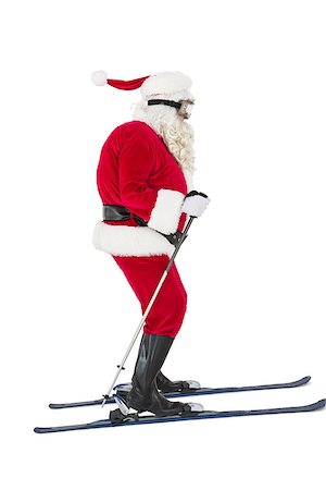 santa claus ski - Festive father christmas skiing on white background Foto de stock - Super Valor sin royalties y Suscripción, Código: 400-07902418