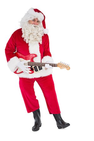 Happy santa playing electric guitar on white background Stock Photo - Budget Royalty-Free & Subscription, Code: 400-07902410