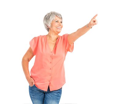 Happy old woman pointing to something Stock Photo - Budget Royalty-Free & Subscription, Code: 400-07903130