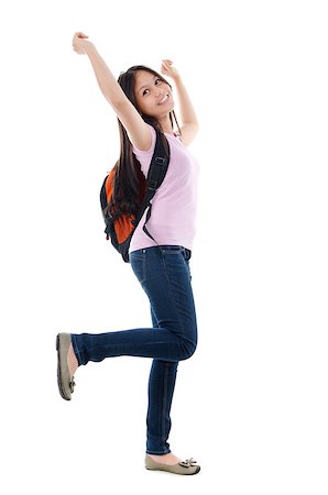 Full length pan Asian teen student cheering with arms raised, isolated on white background. Stock Photo - Budget Royalty-Free & Subscription, Code: 400-07915127