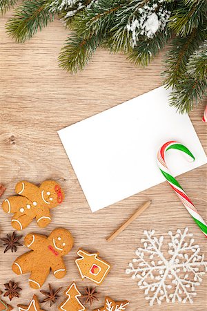 simsearch:400-07299371,k - Christmas fir tree, gingerbread cookies and card for copy space on wooden table Foto de stock - Super Valor sin royalties y Suscripción, Código: 400-07915174
