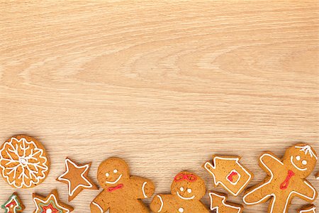 simsearch:400-07175496,k - Homemade various christmas gingerbread cookies on wooden background with copy space Fotografie stock - Microstock e Abbonamento, Codice: 400-07915172