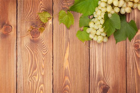 simsearch:400-08110621,k - Bunch of white grapes on wooden table background with copy space Stock Photo - Budget Royalty-Free & Subscription, Code: 400-07915189