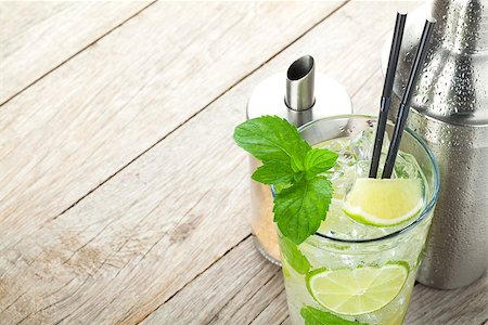 simsearch:400-07715048,k - Fresh mojito cocktail and bar utensils on wooden table with copy space Stock Photo - Budget Royalty-Free & Subscription, Code: 400-07915182