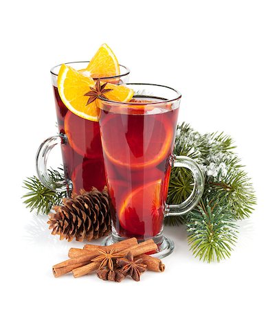 Christmas mulled wine with spices and snowy fir tree. Isolated on white background Stock Photo - Budget Royalty-Free & Subscription, Code: 400-07915214