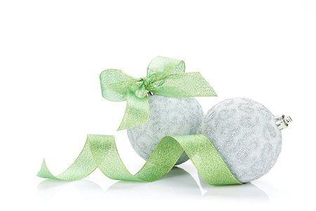 simsearch:400-07921368,k - Christmas baubles and green ribbon. Isolated on white background Stock Photo - Budget Royalty-Free & Subscription, Code: 400-07915311