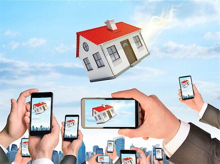 pushing door - Hands holding smart phones and shoot video as falling house. City on background Stock Photo - Budget Royalty-Free & Subscription, Code: 400-07915415