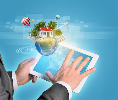 Man hands using tablet pc. Earth with buildings and trees near tablet. Element of this image furnished by NASA Stock Photo - Budget Royalty-Free & Subscription, Code: 400-07915412