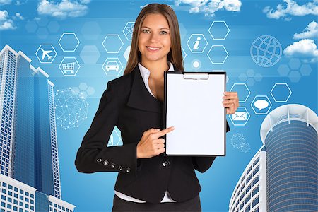 simsearch:400-07895693,k - Businesswoman holding paper holde. Building and hexagons with icons as backdrop Stock Photo - Budget Royalty-Free & Subscription, Code: 400-07915469