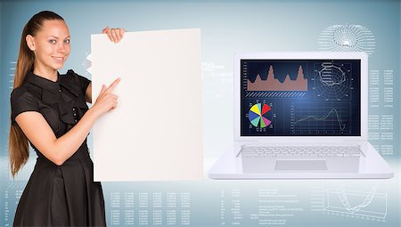 simsearch:400-07895693,k - Businesswoman holding empty paper. Laptop and graphs as backdrop Stock Photo - Budget Royalty-Free & Subscription, Code: 400-07915462