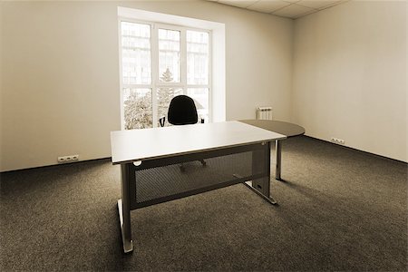 simsearch:700-00094145,k - Chair and table at a window at modern office Stock Photo - Budget Royalty-Free & Subscription, Code: 400-07915597