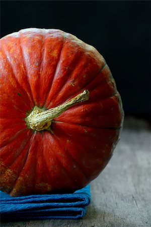 simsearch:400-05709481,k - Fresh organic pumpkin with stem at an October, closeup Stock Photo - Budget Royalty-Free & Subscription, Code: 400-07915791