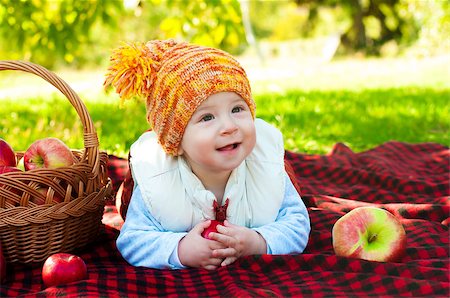 simsearch:400-04067084,k - Little boy with apple in autumn park Stock Photo - Budget Royalty-Free & Subscription, Code: 400-07915897